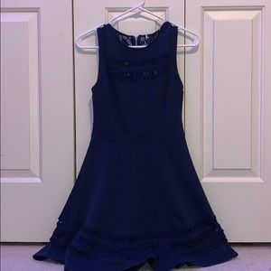 Navy dress, with lace patterns
